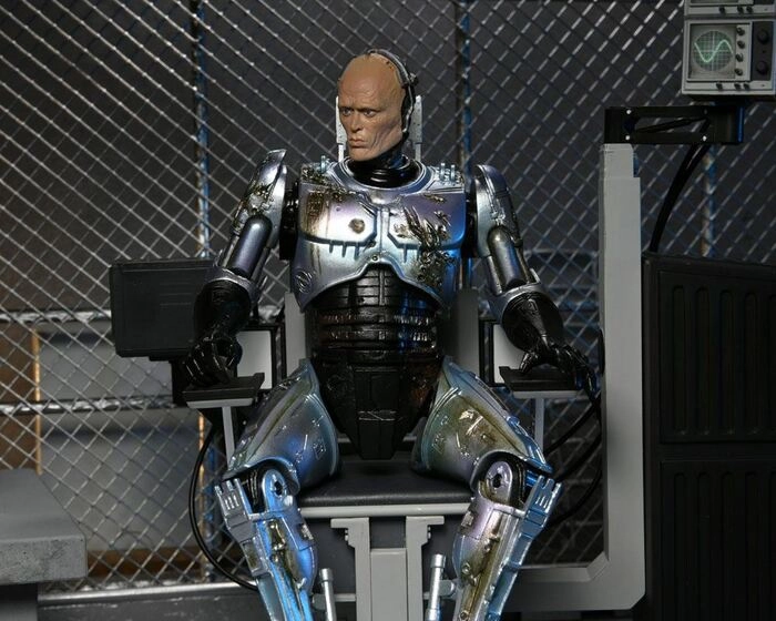 ROBOCOP - Battle Damaged RoboCop with Chair Ultimate Action Figure